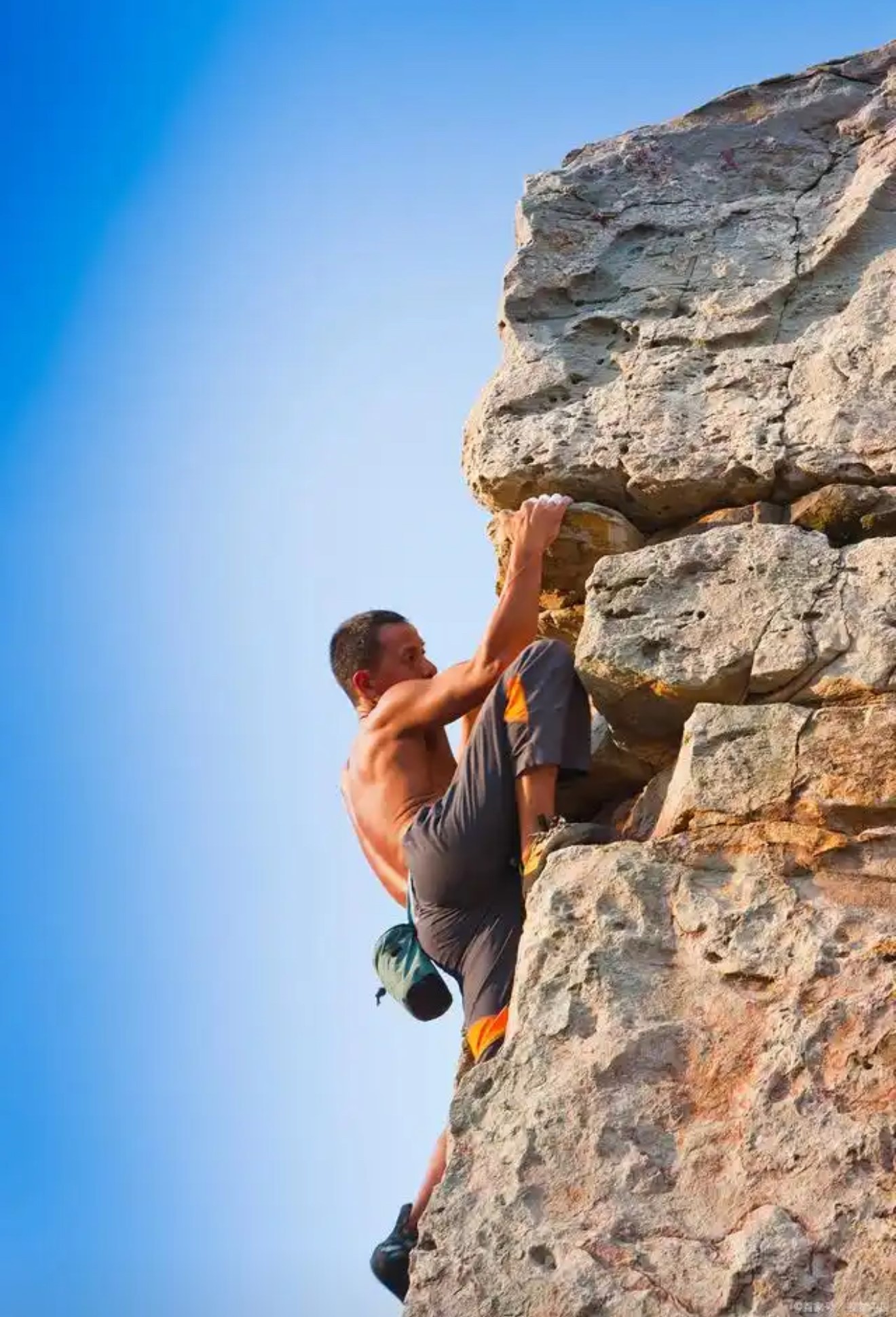 Man climbing a mountain